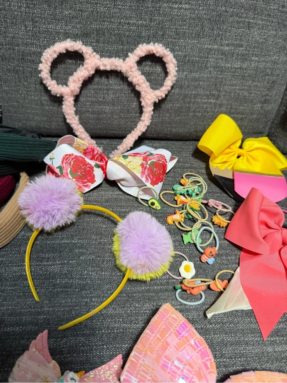 Bundle of girls hair accessories and a small little girls purse.